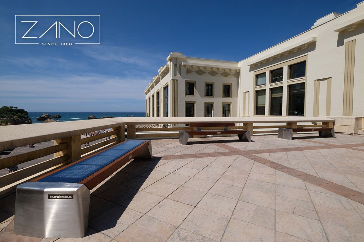 Public solar benches made of stainless steel and exotic wood (iroko painted teak color)