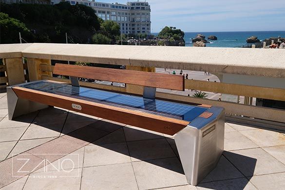 Biarritz solar benches by zano made of stainless steel and iroko wood