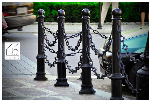street separating bollards on Szpitalna street with double chain