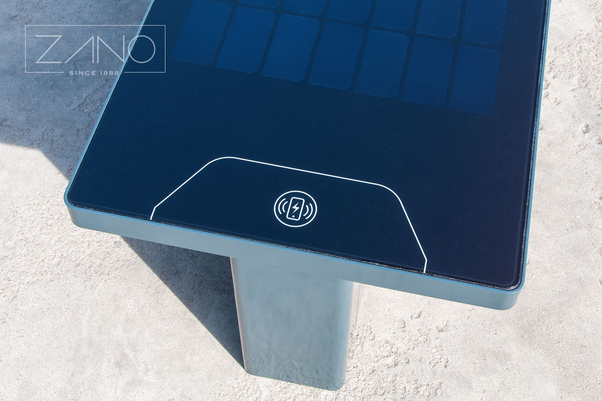 Induction charger for mobile devices in a solar bench